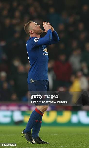 Wayne Rooney of Manchester United celebrates scoring their first goal and becoming the club's record goalscorer with 250 goals during the Premier...