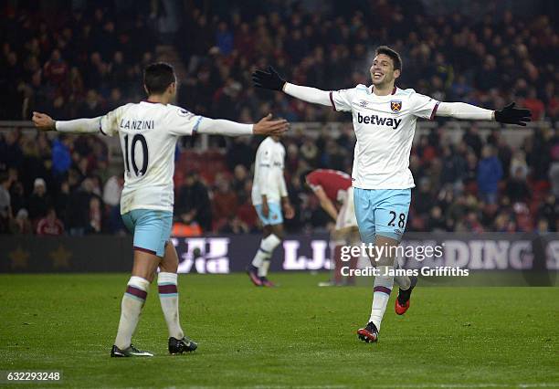 Jonathan Calleri of West Ham United celebrates his goal with fellow Argentian Manuel Lanzini during the Premier League match between Middlesbrough...