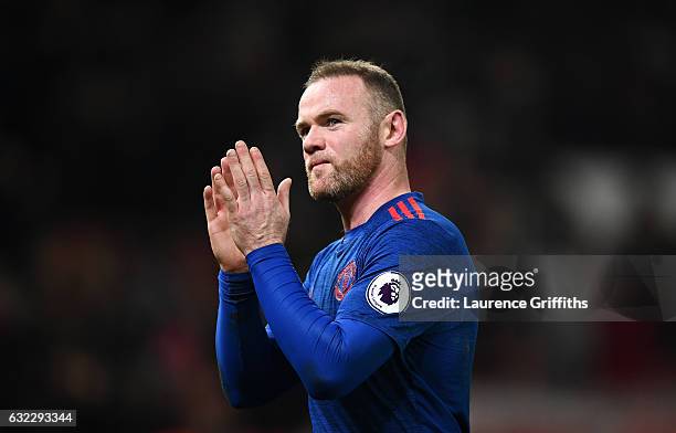 Wayne Rooney of Manchester United shows appreciation to the fans after the Premier League match between Stoke City and Manchester United at Bet365...