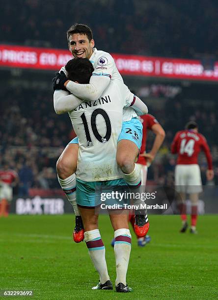 Jonathan Calleri of West Ham United celebrates scoring his sides third goal with Manuel Lanzini of West Ham United during the Premier League match...