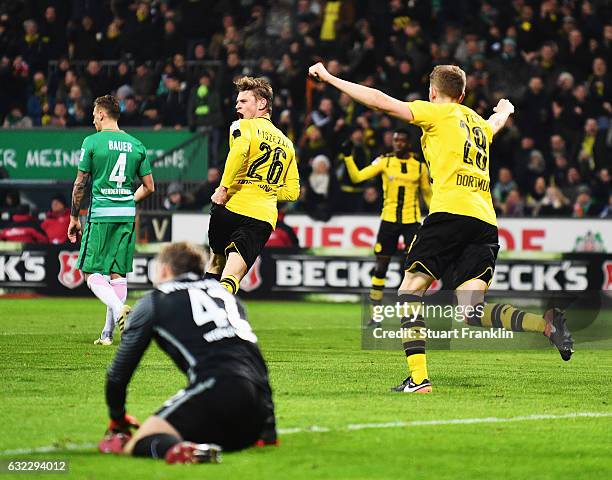 Lukasz Piszczek of Dortmund celebrates scoring the second goal during the Bundesliga match between Werder Bremen and Borussia Dortmund at...