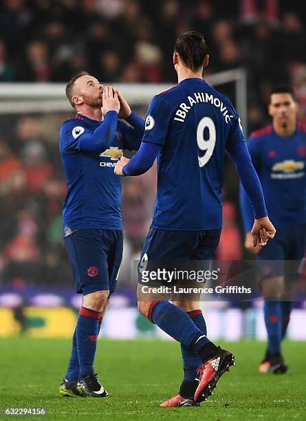Wayne Rooney of Manchester United celebrates scoring his sides first goal with Zlatan Ibrahimovic of Manchester United during the Premier League...