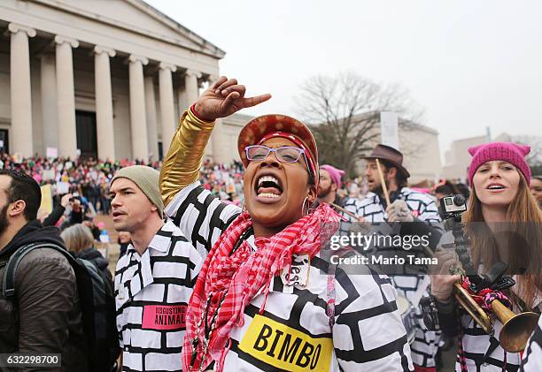 Woman chants while attending the Women's March on Washington on January 21, 2017 in Washington, DC. Large crowds are attending the anti-Trump rally a...