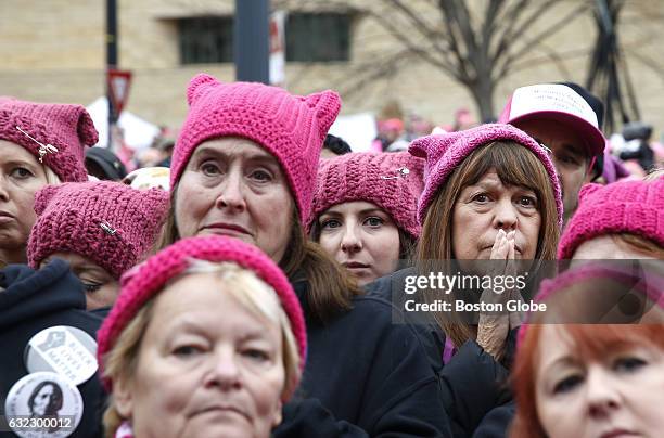 Woman reacts as she listens to a speaker during a rally at the Women's March on Washington, Jan. 21, 2017.