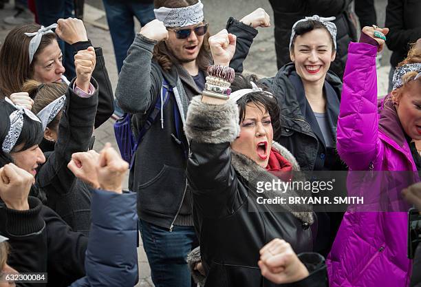 Protesters march in New York during the Womens March on January 21, 2017. Hundreds of thousands of people flooded US cities Saturday in a day of...