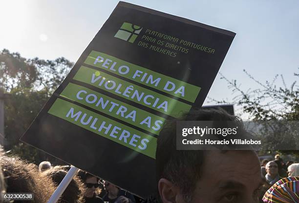 Demonstrators gather to protest against US President Donald Trump in front of the US Embassy on January 21, 2017 in Lisbon, Portugal. Simultaneous...