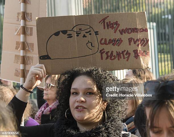 Demonstrators gather to protest against US President Donald Trump in front of the US Embassy on January 21, 2017 in Lisbon, Portugal. Simultaneous...