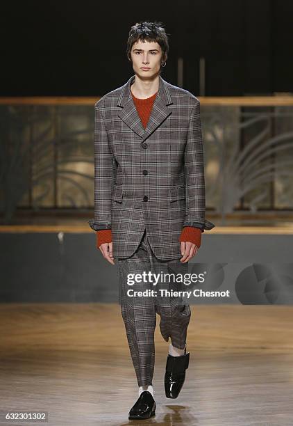 Model walks the runway during the Wooyoungmi Menswear Fall/Winter 2017-2018 show as part of Paris Fashion Week on January 21, 2017 in Paris, France.