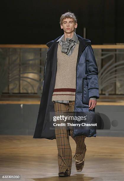 Model walks the runway during the Wooyoungmi Menswear Fall/Winter 2017-2018 show as part of Paris Fashion Week on January 21, 2017 in Paris, France.