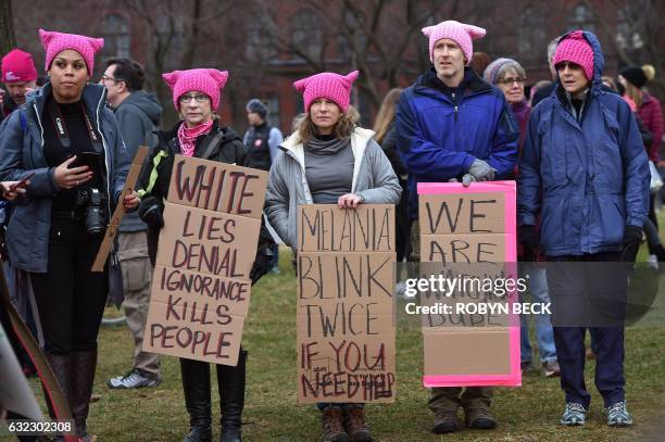 Protesters march in Washington, DC, during the Womens March on January 21, 2017. - Hundreds of thousands of people flooded US cities Saturday in a...