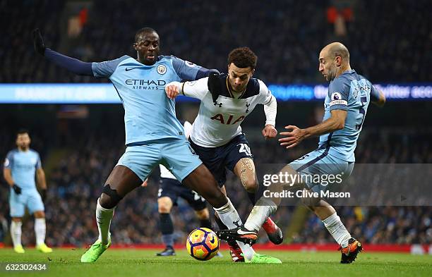 Yaya Toure of Manchester City nd Pablo Zabaleta of Manchester City tackle Dele Alli of Tottenham Hotspur during the a Premier League match between...