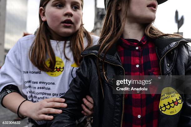 Young girls attend a protest held in solidarity with the Washington DC Women's March in Dublin, Ireland on January 21, 2017.