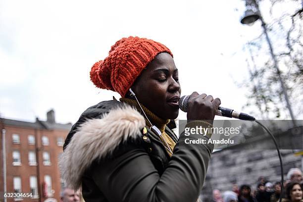 Malawian asylum seeker Ellie Kisyombe attends a protest held in solidarity with the Washington DC Women's March in Dublin, Ireland on January 21,...