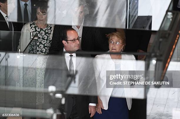 French President Francois Hollande and his Chilean counterpart Michelle Bachelet visit the Museum of Memory and Human Rights in Santiago on January...