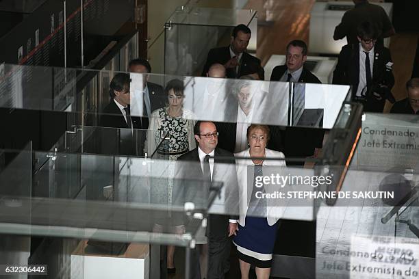 French President Francois Hollande and his Chilean counterpart Michelle Bachelet visit the Museum of Memory and Human Rights in Santiago on January...