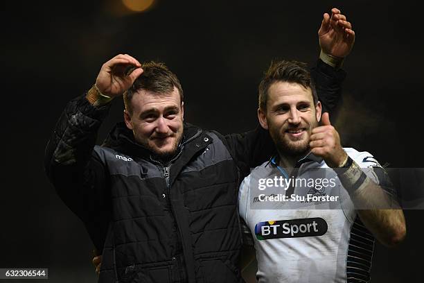 Glasgow wing Tommy Seymour and Stuart Hogg celebrate after the European Rugby Champions Cup match between Leicester Tigers and Glasgow Warriors at...