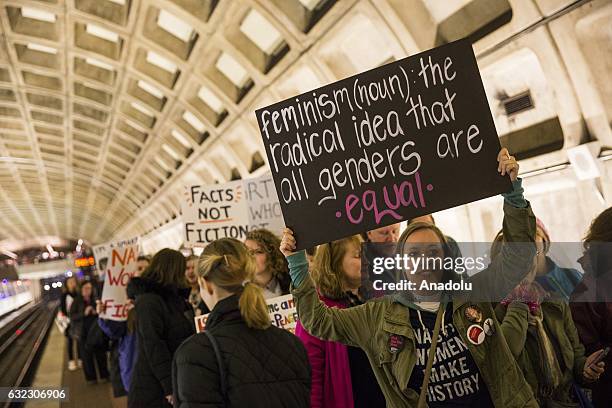 Protestors fill the platform after their train unloaded them at Judiciary Square for the Women's March to protest President Donald Trump in...