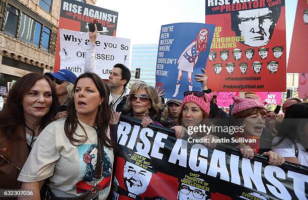 Actresses Marcia Gay Harden takes a Jane Fonda march during the Women's March on January 21, 2017 in Los Angeles, California. Tens of thousands of...