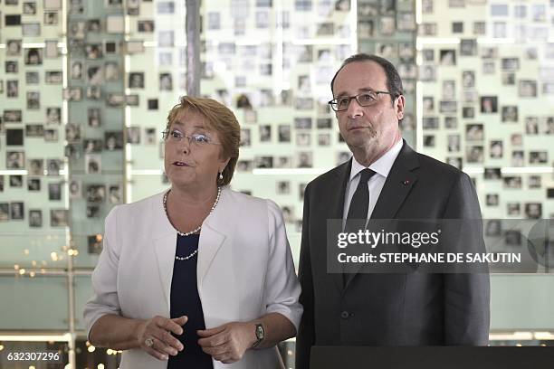 French President Francois Hollande and his Chilean counterpart Michelle Bachelet visit the Museum of Memory and Human Rights in Santiago on January...