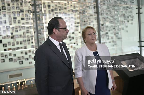 French President Francois Hollande and his Chilean counterpart Michelle Bachelet visit the Museum of Memory and Human Rights in Santiago on January...