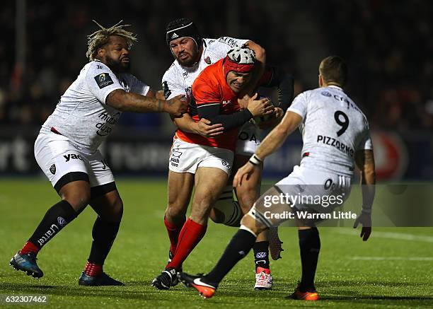 Schalk Brits of Saracens is tacked during the European Rugby Champions Cup between Saracens and RC Toulon at Allianz Park on January 21, 2017 in...