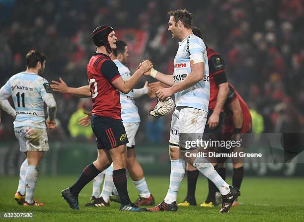 Limerick , Ireland - 21 January 2017; Tyler Bleyendaal of Munster exchanges a handshake with fellow New Zealander Ali Williams of Racing 92 after the...