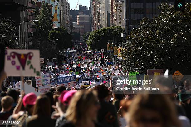 Marchers fill Hill Street during the Women's March on January 21, 2017 in Los Angeles, California. Tens of thousands of people took to the streets of...