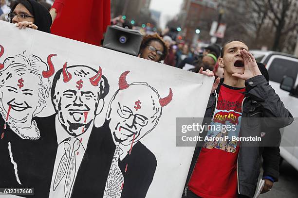 Protesters chant during the Women's March on Washington January 21, 2017 in Washington, DC. The march is expected to draw thousands from across the...