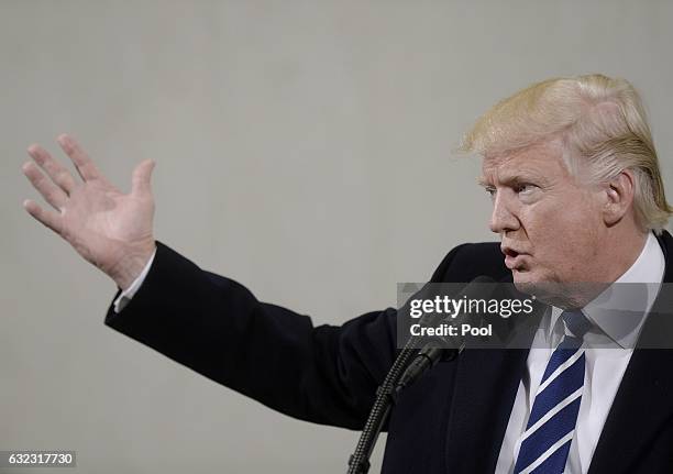 President Donald Trump speaks at the CIA headquarters on January 21, 2017 in Langley, Virginia . Trump spoke with about 300 people in his first...