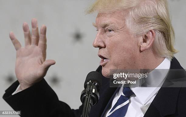 President Donald Trump speaks at the CIA headquarters on January 21, 2017 in Langley, Virginia . Trump spoke with about 300 people in his first...