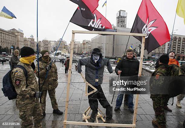 Ukrainians take a part in an international protest &quot;Stop Putin! Stop war!&quot; on Independence Square, in Kiev,Ukraine,21 January, 2017.