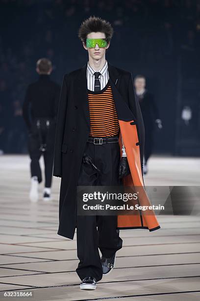 Model walks the runway during the Dior Homme Menswear Fall/Winter 2017-2018 show as part of Paris Fashion Week on January 21, 2017 in Paris, France.