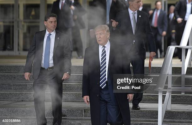 President Donald Trump leaves the CIA headquarters after speaking to 300 people on January 21, 2017 in Langley, Virginia . Trump spoke with about 300...