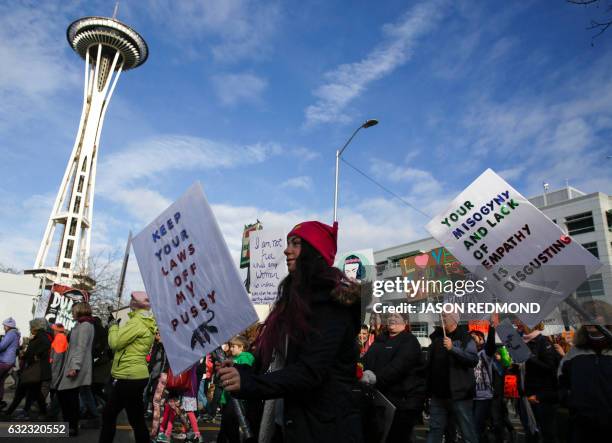 An estimated 120,000 people participate in the Women's March in Seattle, Washington, on January 21, 2017. - Led by women in pink "pussyhats,"...