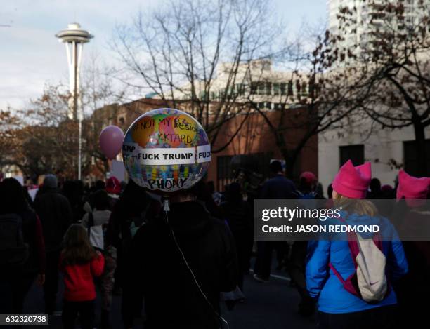 An estimated 120,000 people participate in the Women's March in Seattle, Washington, on January 21, 2017. - Led by women in pink "pussyhats,"...