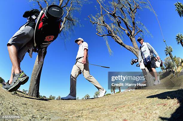 Dominic Bozzelli walks across the eighth green during the third round of the CareerBuilder Challenge in Partnership with The Clinton Foundation at...