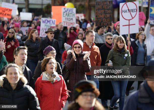 An estimated 120,000 people participate in the Women's March in Seattle, Washington on January 21, 2017. - Led by women in pink "pussyhats," hundreds...