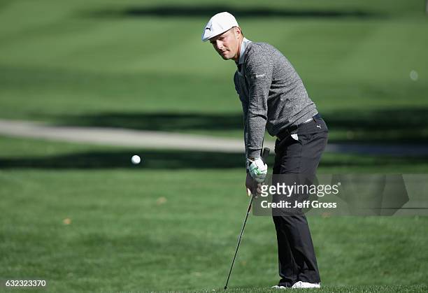 Bryson Dechambeau plays his shot on the 16th hole during the third round of the CareerBuilder Challenge in Partnership with The Clinton Foundation at...