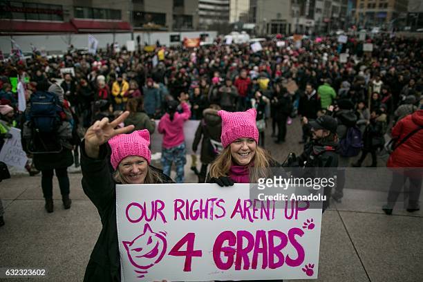 Demonstrators attend the Women's March to protest President Donald Trump, in Montreal, Canada on January 21, 2017. Thousands of people gather in...