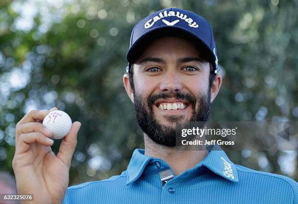 Adam Hadwin of Canada poses with his ball after shooting a 59 during the third round of the CareerBuilder Challenge in Partnership with The Clinton...