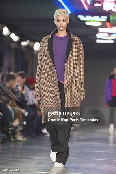 Model walks the runway during the Ami Alexandre Mattiussi Menswear Fall/Winter 2017-2018 show as part of Paris Fashion Week on January 21, 2017 in...