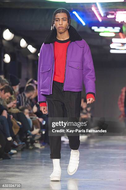 Model walks the runway during the Ami Alexandre Mattiussi Menswear Fall/Winter 2017-2018 show as part of Paris Fashion Week on January 21, 2017 in...