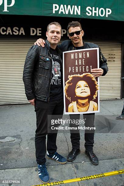 Artist Shepard Fairey and actor James Franco attend the women's march in Los Angeles on January 21, 2017 in Los Angeles, California.