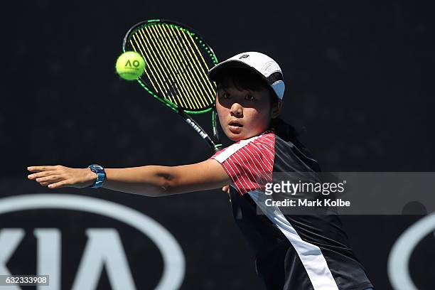 Anri Nagata of Japan plays a shot against Alexandra Bozovic of Australia during the Australian Open 2017 Junior Championships at Melbourne Park on...