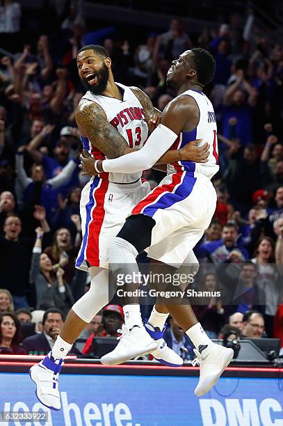 Marcus Morris of the Detroit Pistons celebrates his buzzer beating game winning shot with Reggie Jackson to beat the Washington Wizards 113-112 at...