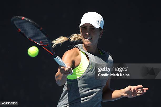 Alexandra Bozovic of Australia plays a shot against Anri Nagata of Japan during the Australian Open 2017 Junior Championships at Melbourne Park on...