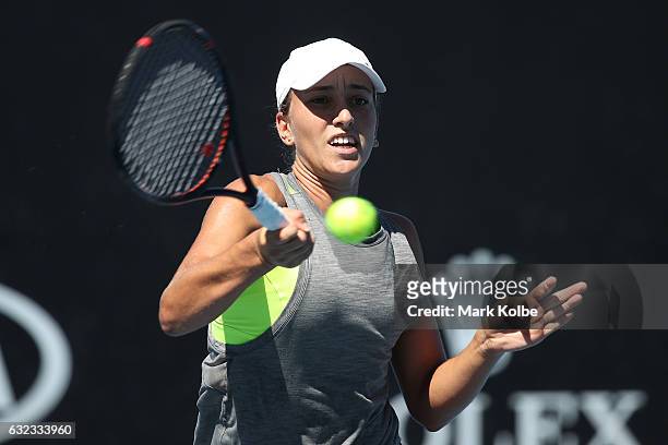 Alexandra Bozovic of Australia plays a shot against Anri Nagata of Japan during the Australian Open 2017 Junior Championships at Melbourne Park on...