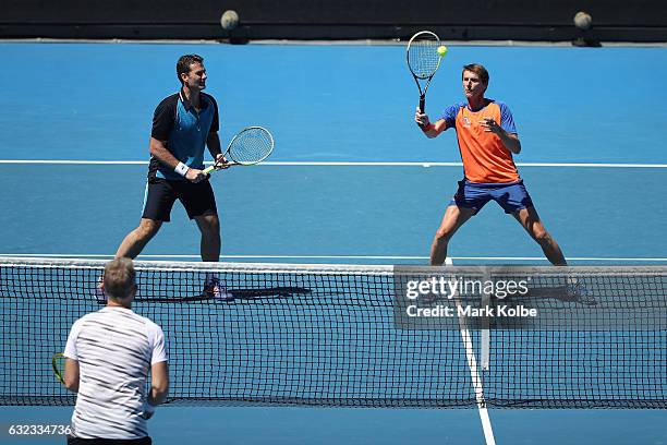 Jacco Eltingh and Paul Haarhuis of the Netherlands compete against Jonas Bjorkman and Thomas Johansson of Sweden in their legends doubles match on...