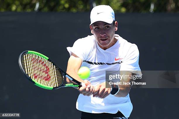 Yshai Oliel of Israel competes in his first round match against Francesco Forti of Italy during the Australian Open 2017 Junior Championships at...