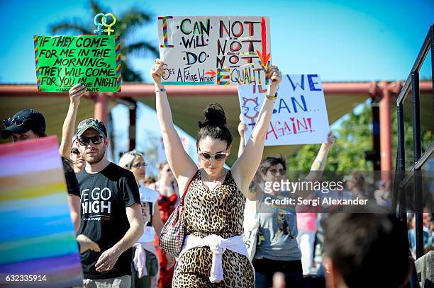 Demonstrators attend the rally at the Women's March at Bayfront Park Amphitheater on January 21, 2017 in Miami, Florida.